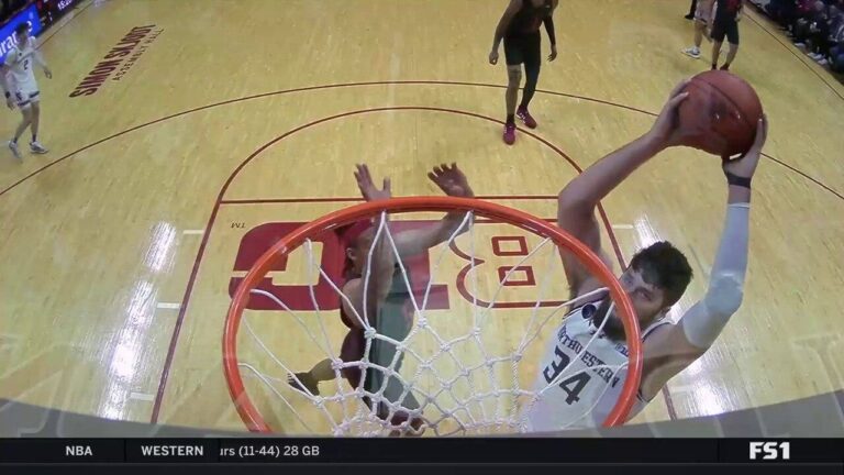 Matthew Nicholson slams down a monster dunk to extend Northwestern