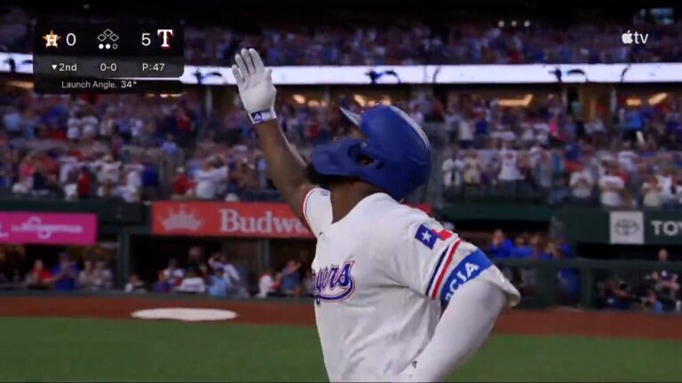 Adolis García BLASTS a 3-run homer to extend the Rangers