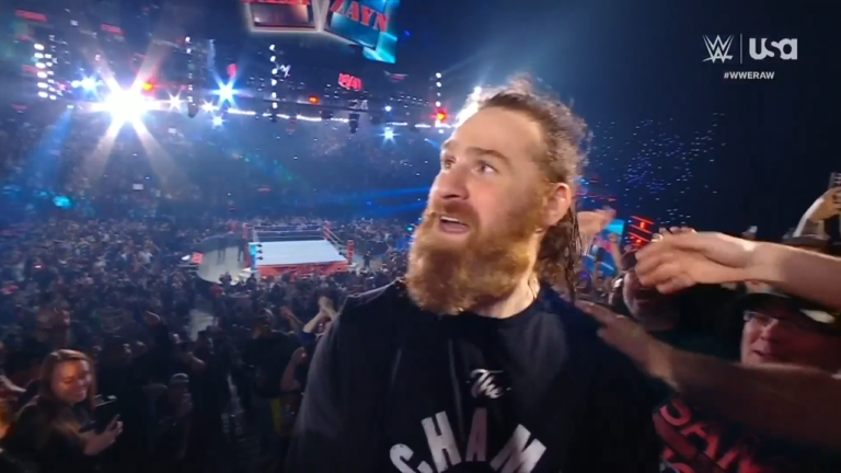 Sami Zayn iconic entrance through front door for hometown show after Jey Uso walk out