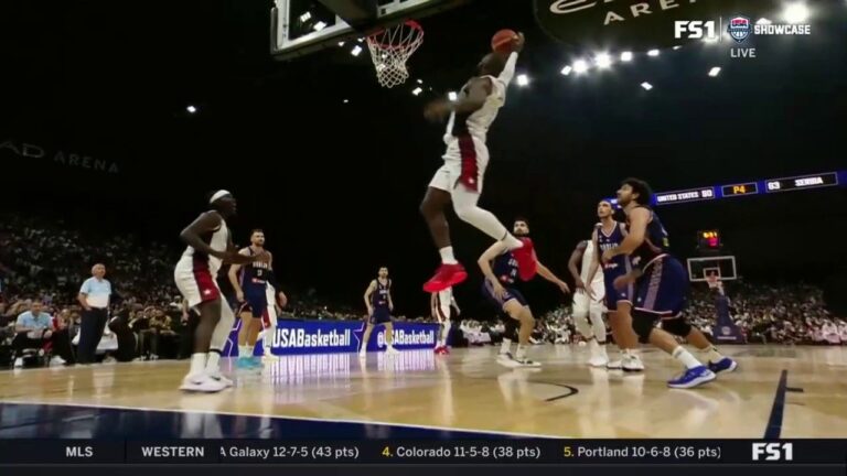 LeBron James throws down a vicious one-handed dunk off the lob from Bam Adebayo