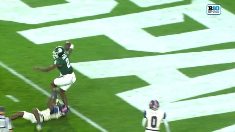 Aidan Chiles scrambles for an 11-yard TD, extending Michigan State