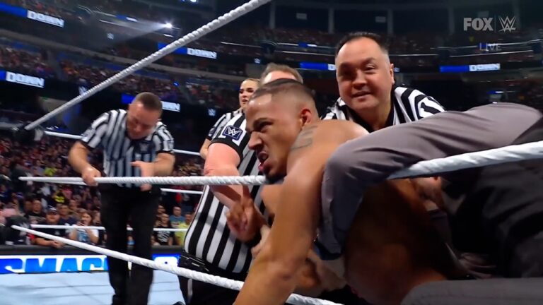 Carmelo Hayes and Andrade separated by WWE officials after match turns to brawl