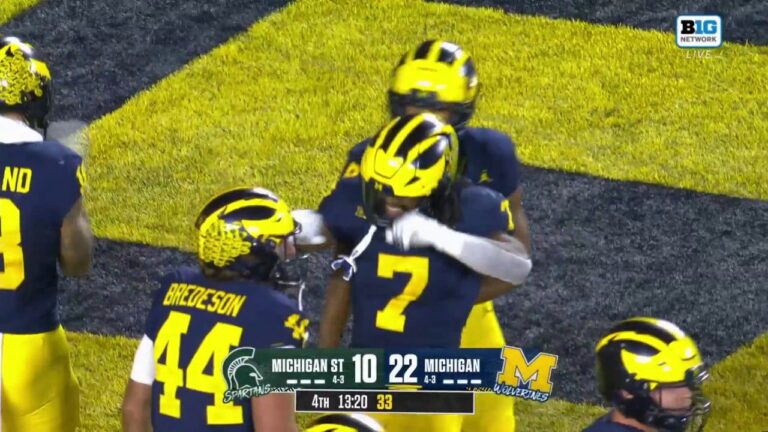 RB Donovan Edwards finds Colston Loveland for a 23-yard TD to extend Michigan