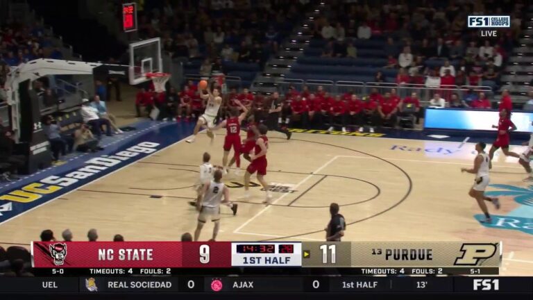 Camden Heide throws down the alley-oop in transition, extending Purdue