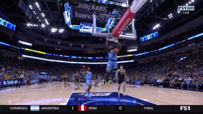 Chase Ross gets the steal and throws down a two-handed jam as Marquette leads 18-15 over Purdue